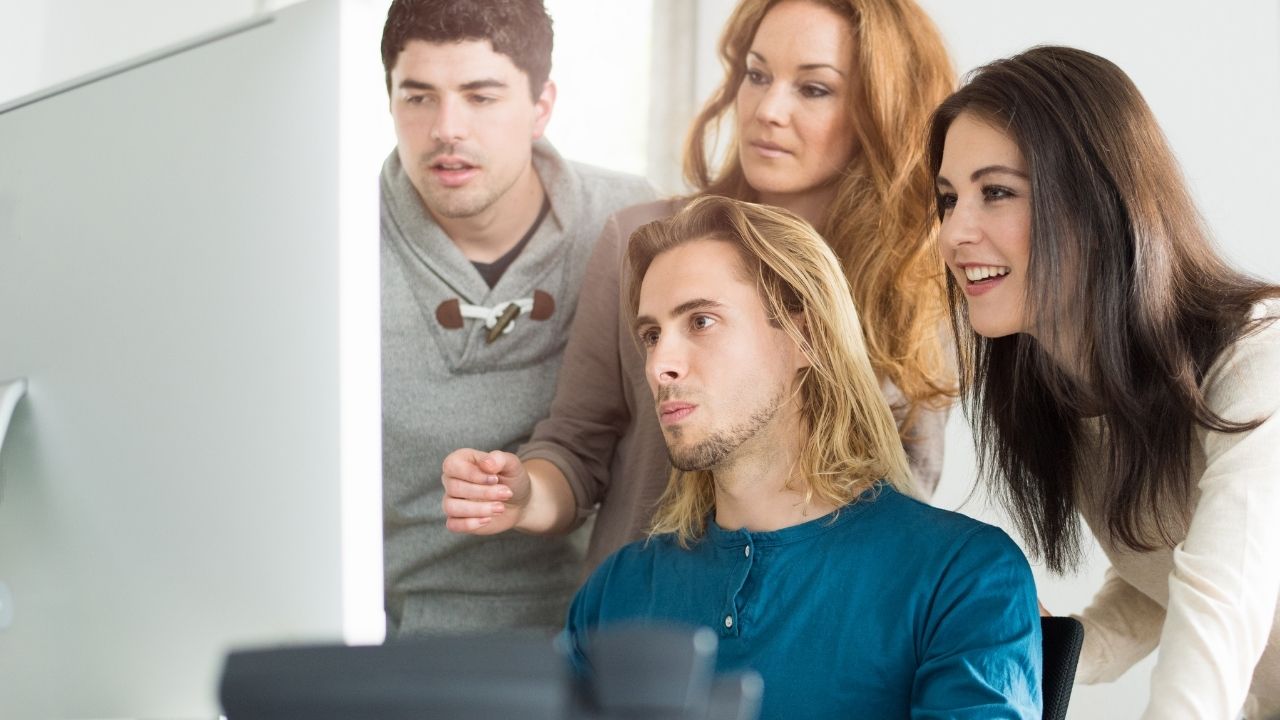 Startup company team checking new website